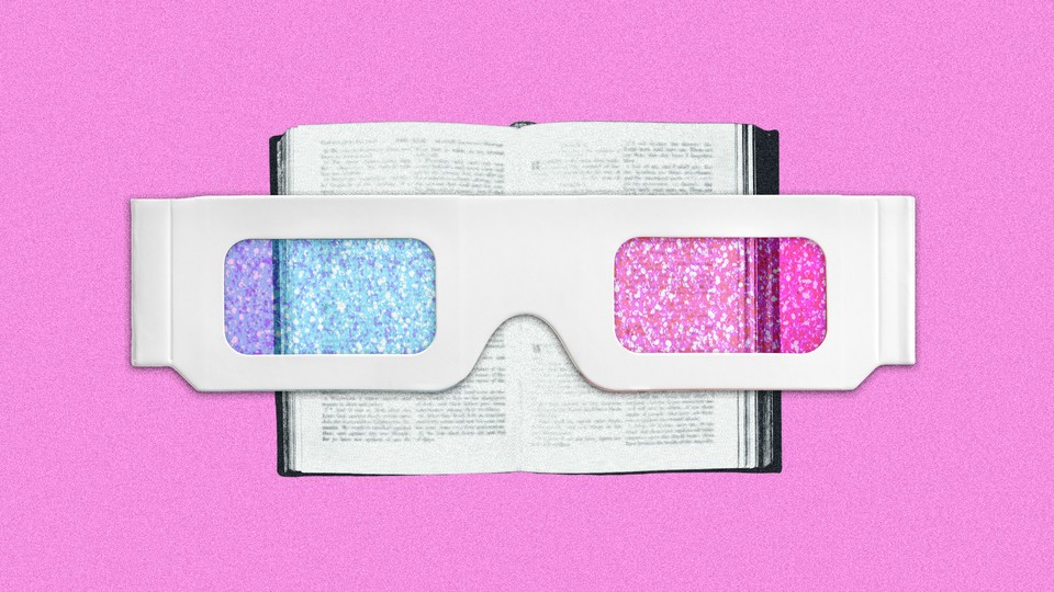 A pair of old-school 3D glasses over a book on a pink background.