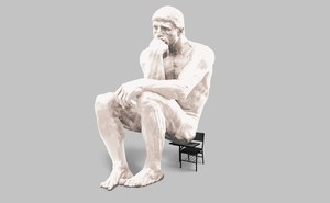 illustration of oversized white "Thinker" sculpture resting on small black schooldesk chair on gray background