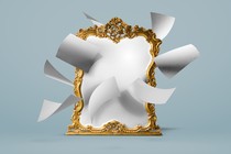 a mirror with pages flying around it