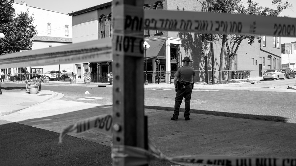 Law enforcement investigating a mass-shooting scene on August 4, 2019, in Dayton, Ohio