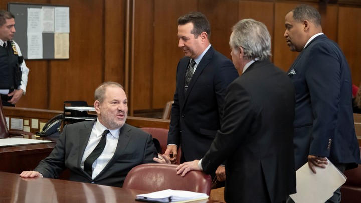 Film producer Harvey Weinstein with attorneys Jose Baez, Ronald S. Sullivan Jr., and Benjamin Brafman