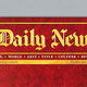 An image of a red Daily News cover with yellow font