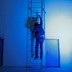 A man climbs a ladder. 