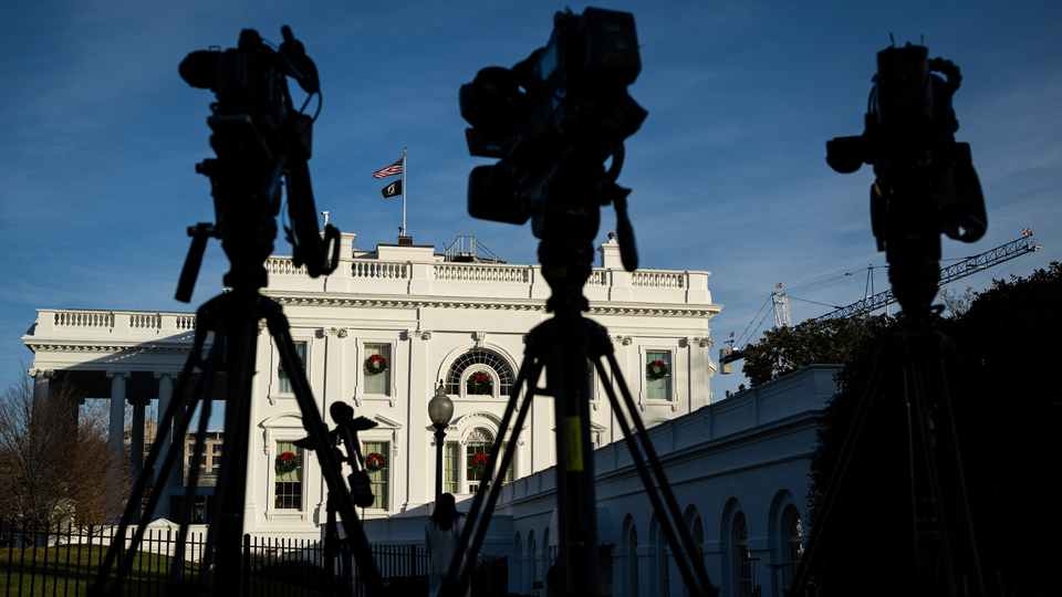 Television cameras pointed at the White House