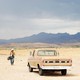 A still showing the Western landscape and a truck in the film "No Country for Old Men"
