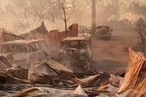 North of Chico, California, the Park Fire burned vans, cars, and houses in its path.