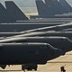 An image of US Air Force B-52H long range strategic bombers sitting on a tarmac.