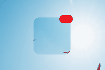 A square in the shape of an app on an iPhone screen shows the wings of two birds against a blue sky, and that square is against a blue sky