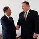 Kim Yong Chol and Mike Pompeo shaking hands