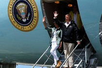 President Trump and First Lady Melania Trump arrive aboard Air Force One to survey hurricane damage, at Muniz Air National Guard Base in Carolina, Puerto Rico.