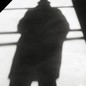 A shadow of a man on the floor