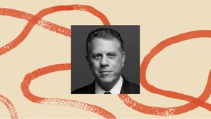 A photo of Michael Waldman, surrounded by an illustrated border