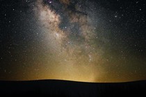 A picture of the Milky Way stretching across the night sky