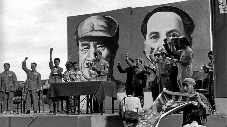 Saluting in front of Mao