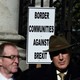 Four protestors hold signs reading, "No Border No Barrier, Respect the Remain Vote" and "Border Communities Against Brexit."