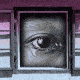 A loop of an eye crying inside an open window