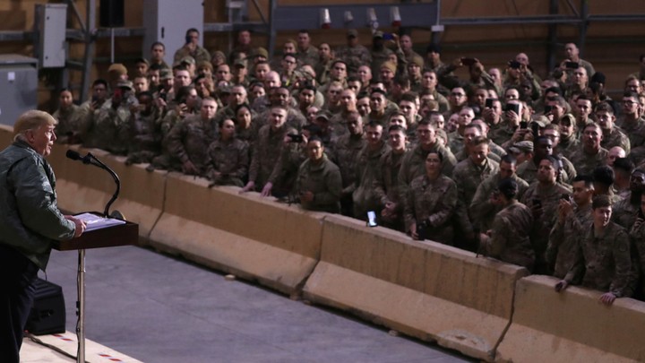 President Donald Trump speaks to U.S. troops.