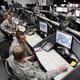 Personnel work at the Air Force Space Command Network Operations and Security Center at Peterson Air Force Base in Colorado.