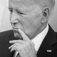 A black-and-white photo of President Joe Biden looking pensive