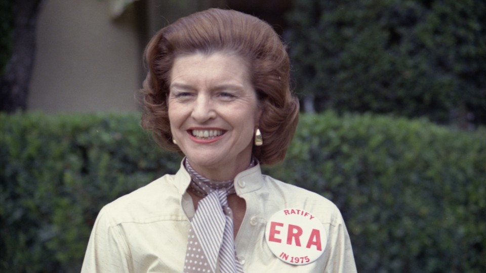 The former first Lady Betty Ford wears a button expressing her support for the ratification of the Equal Rights Amendment.