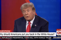A still of Donald Trump at the CNN town hall with a chyron that reads "Question: Why should Americans put you back in the White House?"