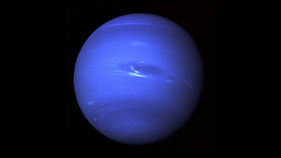 An image of Neptune in all its glorious blue, captured by NASA's Voyager 2 spacecraft in 1989
