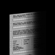 Illustration of a blurry census form fading into a black background