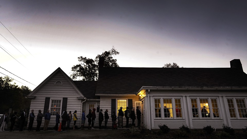 A line forms outside a voting precinct before it opens on November 8, 2016 in Durham, North Carolina.