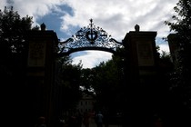 A general silhouette view of one of the many gates to the Harvard University campus