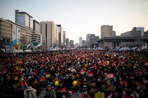 People attend a protest against South Korean President Park Geun Hye.