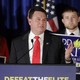 Representative Todd Rokita of Indiana speaking at a lectern