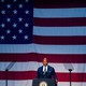 New York City mayor Eric Adams in front of the American flag