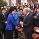 Liu Yandong shakes hands with Stephen Schwarzman as the first class of Schwarzman scholars applaud.