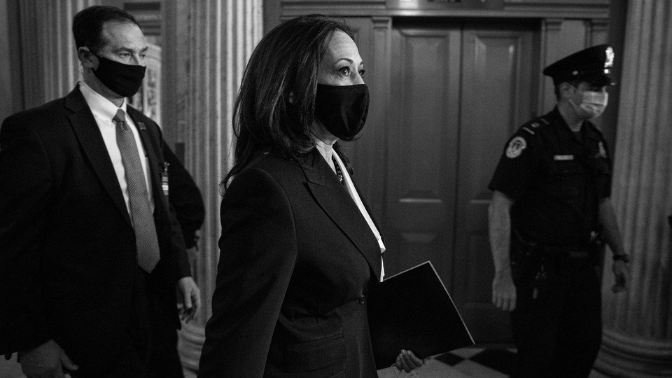 Kamala Harris walking through the halls of Congress.