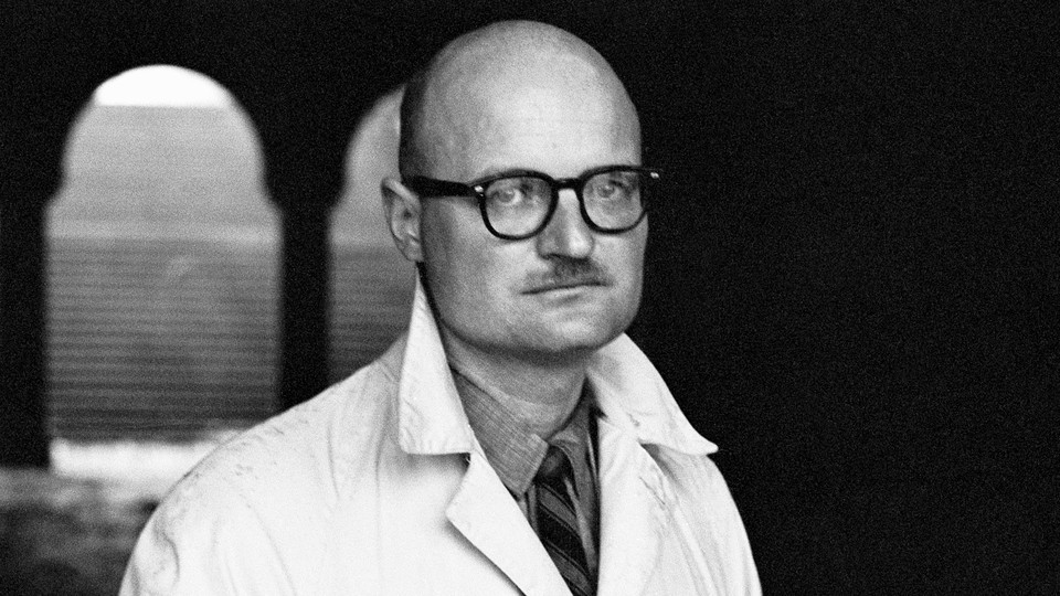 A black and white photograph of a young John Barth