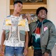 Jabari Banks and SteVonté Hart standing in front of the Banks mansion in "Bel-Air"