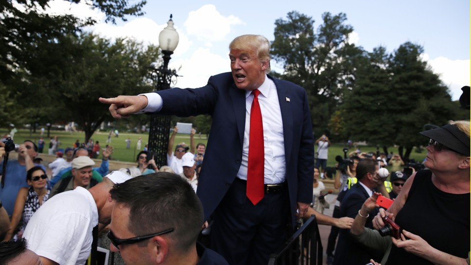 Donald Trump arrives at a Capitol Hill rally to "Stop the Iran Nuclear Deal" in Washington on September 9, 2015. 