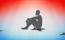 The silhouette of a person sitting on the shadow of a black star, with other shadow stars nearby. The background is a diffuse red, white, and blue.