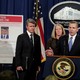 Paul Abbate, the–then FBI assistant director of the Criminal, Cyber, Response, and Services Branch, speaks next to a poster of a suspected Russian hacker in 2017.