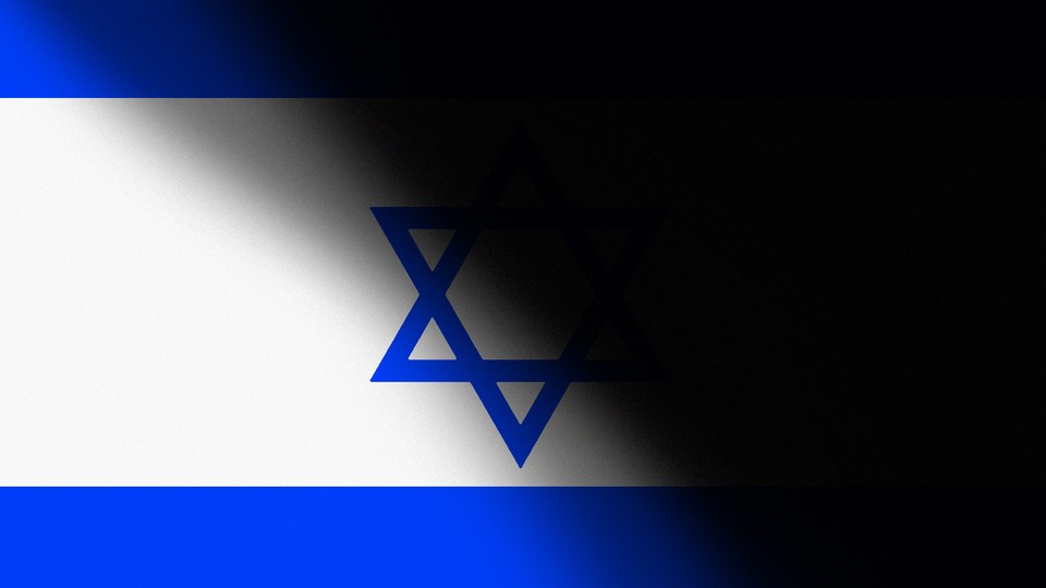 A shadow is cast over the Israeli flag.