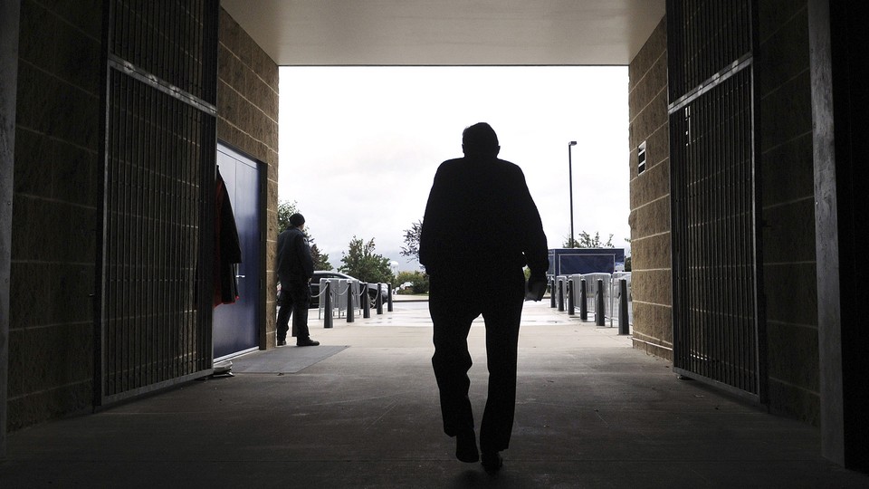 Former Penn State football coach Joe Paterno leaving Beaver Stadium