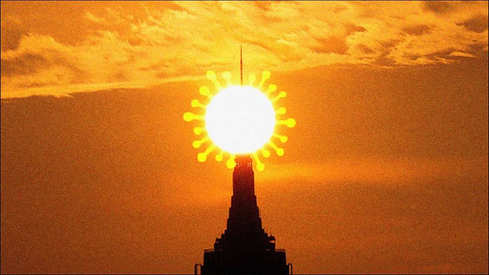 New York City's Empire State Building, with a coronavirus-shaped sun behind it