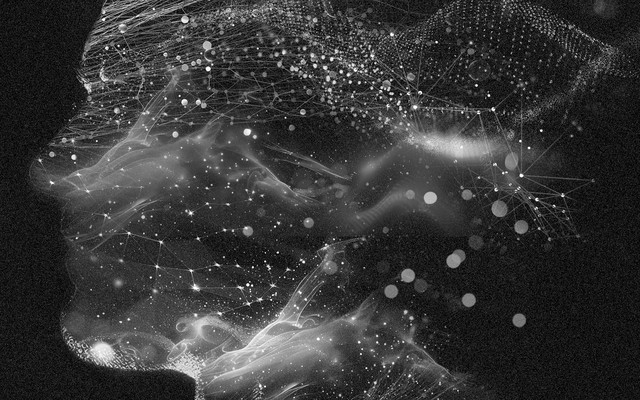 A silhouette of a person formed by waves and stardust
