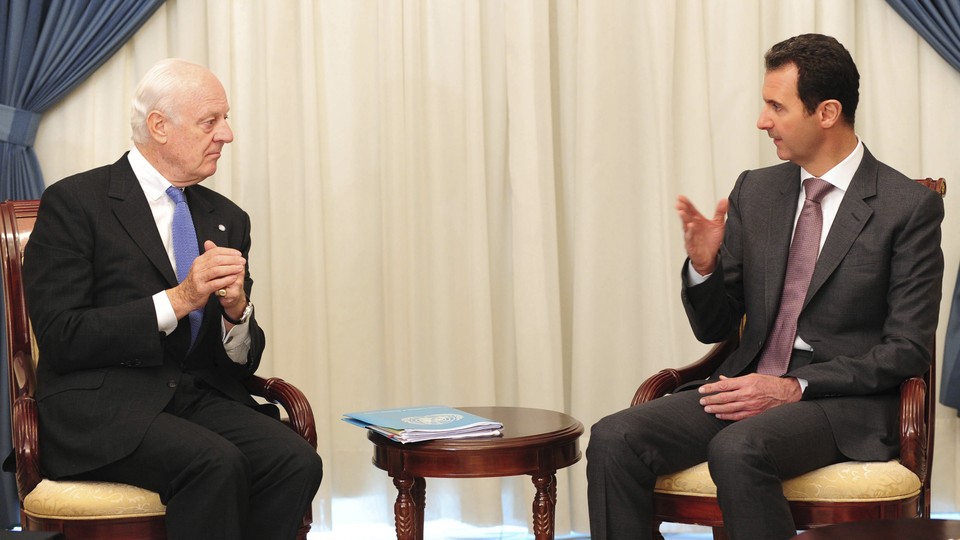 Staffan de Mistura meets with Syrian President Bashar al-Assad in Damascus in 2014.