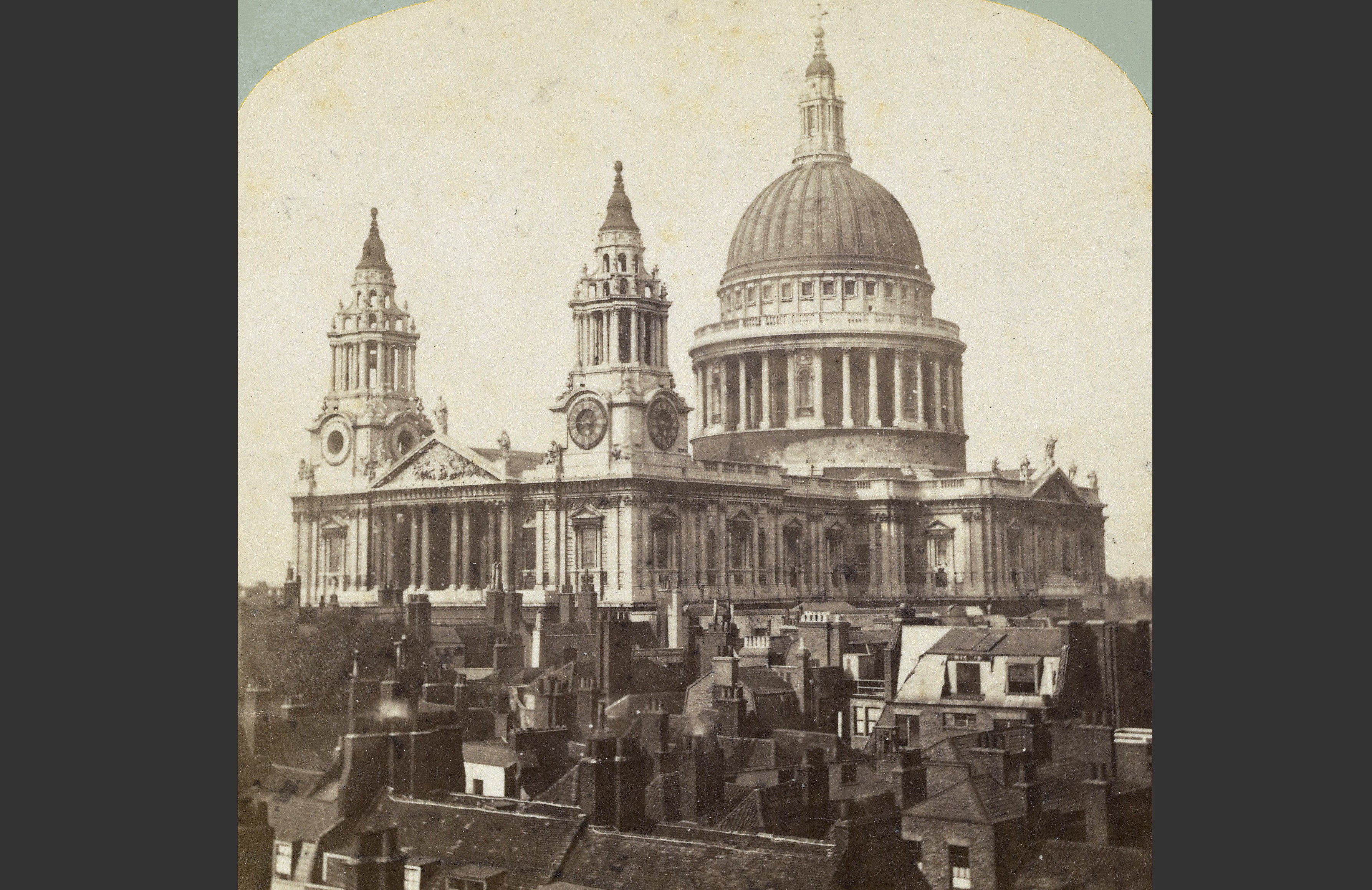 St. Paul's Cathedral in London, rising above a cluster of smaller buildings.