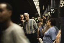 A crowded New York subway station.
