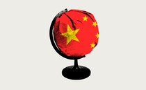 An image of a global with the Chinese flag covering it