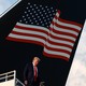 Trump in front of an American flag