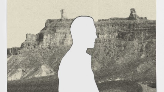 A person-shaped cutout in a landscape