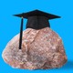 An illustration of a rock wearing a graduation cap